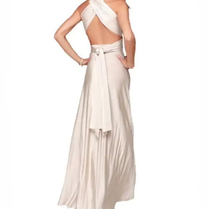  Multiway dress in ivory featuring a crossback wrap style with floor-length hem and tied waist.