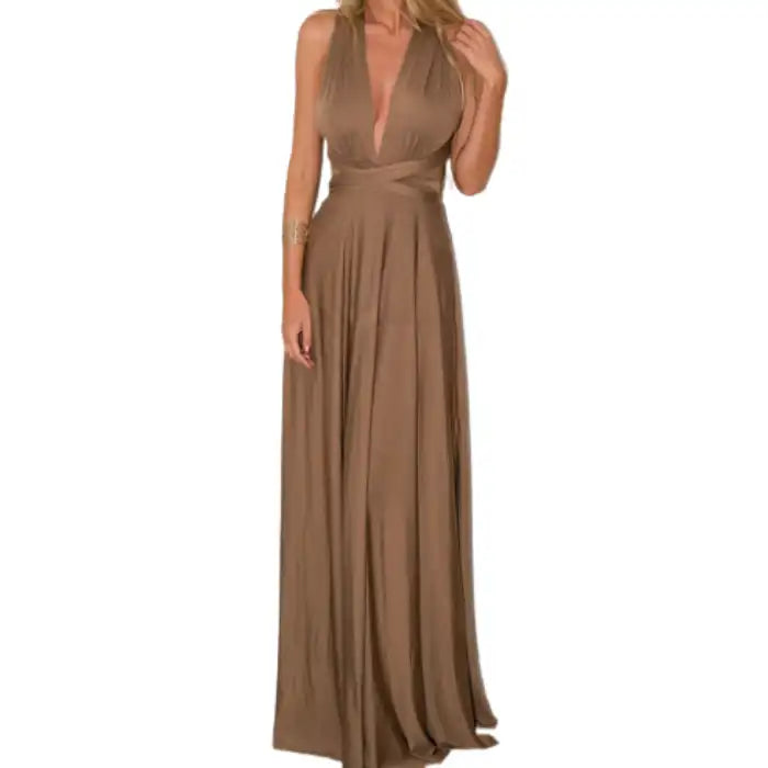 Multiway dress in mocha with deep v-neck and pleated wrap bodice styled in an elegant silhouette.