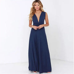  Multiway dress in navy blue featuring a deep v-neck and gathered waist with full-length flow.