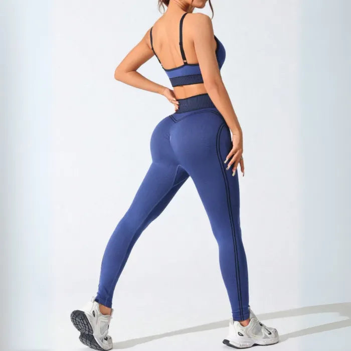 High-performance navy workout set showing back view with ribbed waistband detail and contoured design elements