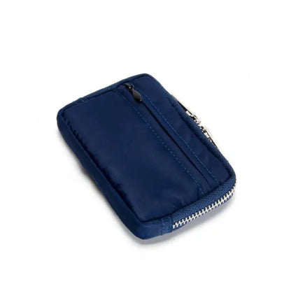 Stylish navy blue wallet with zipper closure and compact design, suitable for secure daily storage.