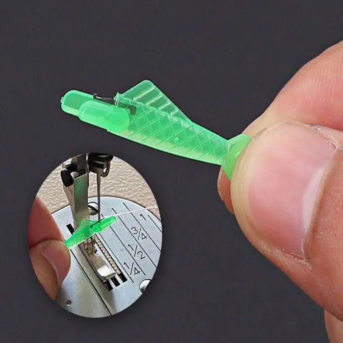 Needle threader being held by hand with inset showing tool threading sewing machine needle precisely