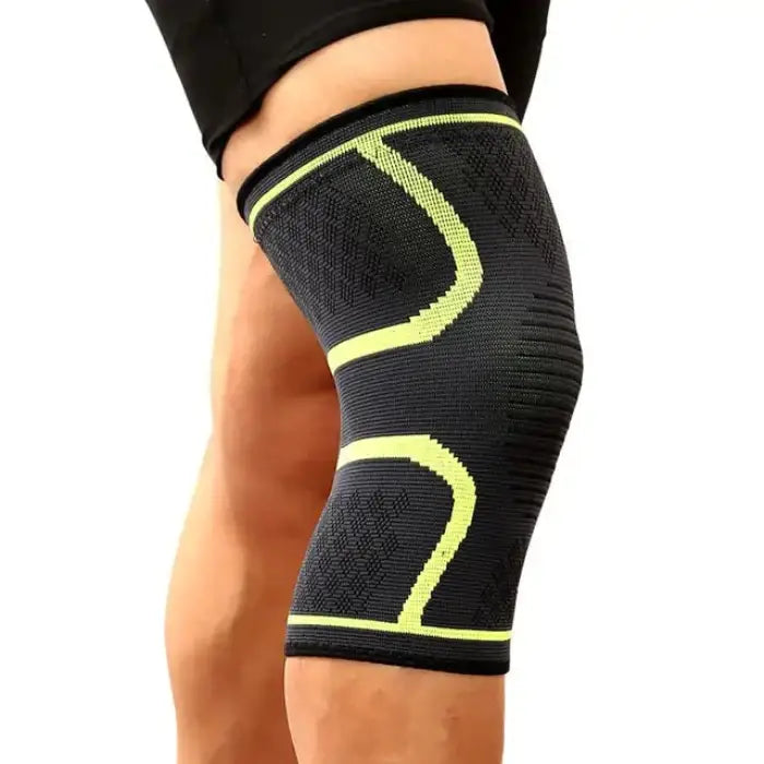 Black knee support sleeve with neon yellow geometric accents, worn on leg highlighting contrast and design