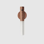 Night Light with dark wood body and motion sensor, mounted vertically for stylish indoor lighting