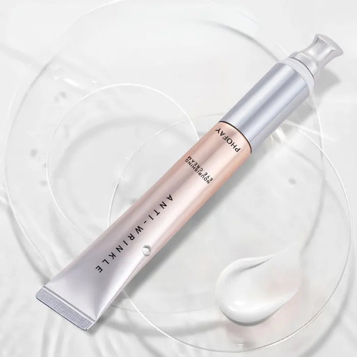 Premium eye cream with silver applicator tip showcasing hydrating formula and anti-aging benefits for delicate eye area