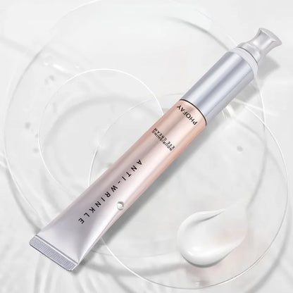 Premium eye cream with silver applicator tip showcasing hydrating formula and anti-aging benefits for delicate eye area