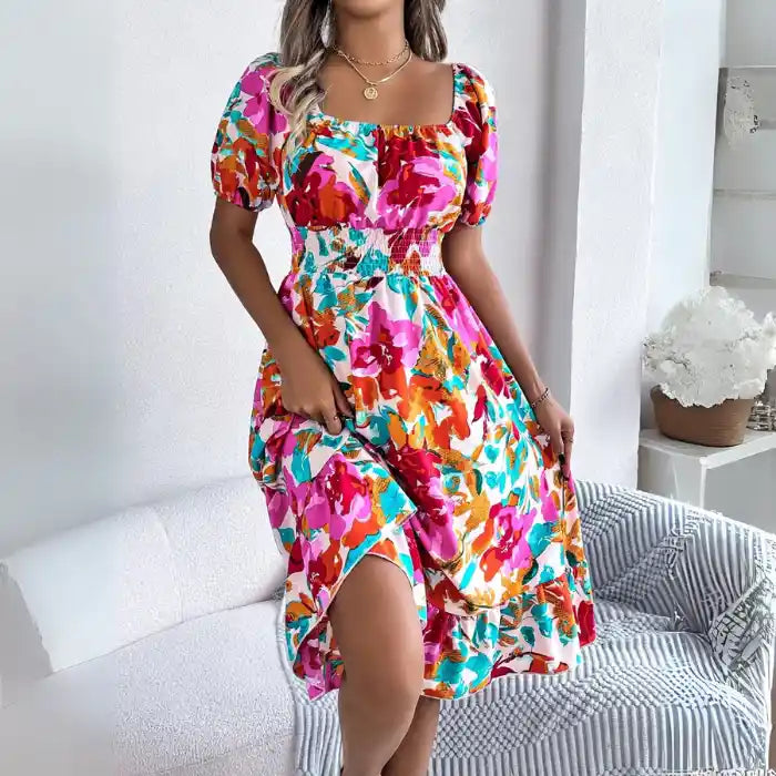 Off shoulder floral midi dress side slit flowing in colorful rose print with puff sleeves.