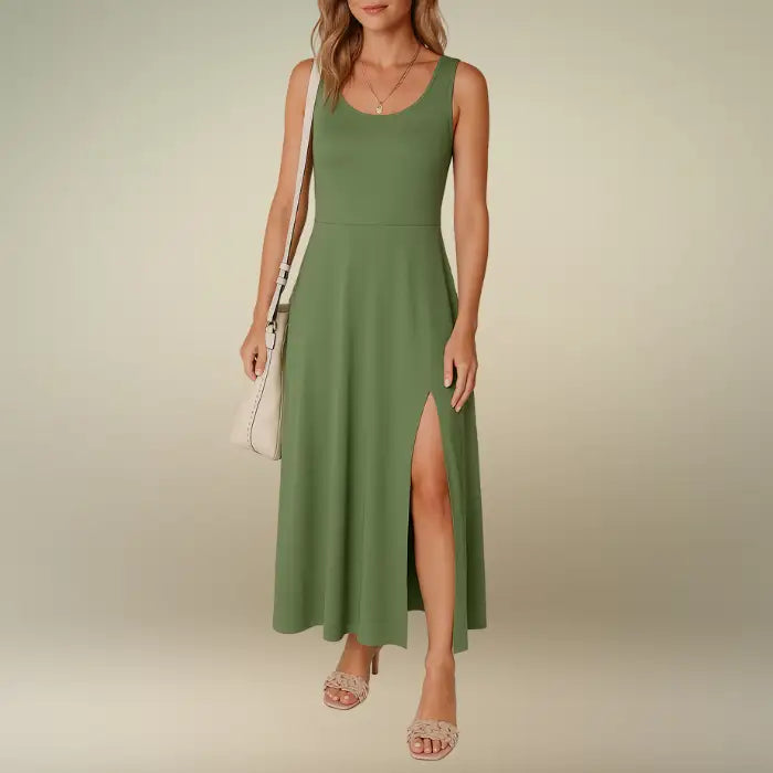 Woman wearing the olive green sleeveless scoop neck midi dress with a flowing A-line skirt and side slit. Order this comfortable summer dress online with fast, free shipping.