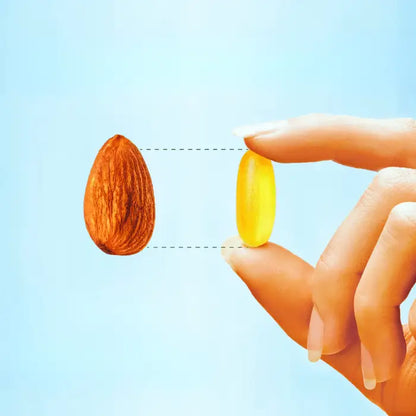 Omega-3 fish oil supplement capsule compared to almond showing size and nutritional equivalence