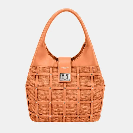 Vibrant orange leather handbag with woven pattern, silver studs, and metal clasp. Bold and stylish accessory for fashion-forward individuals.