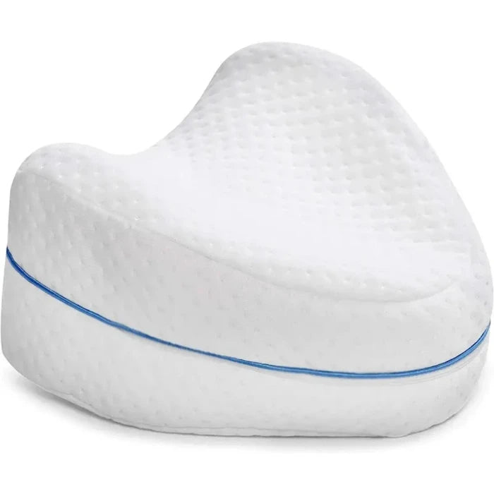 Orthopedic knee pillow with breathable cover for pain relief and comfortable sleeping posture.