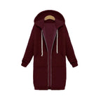 Oversized hoodie for women in burgundy featuring long zip front and cozy fleece warmth, ideal for stylish relaxed cold-weather wear