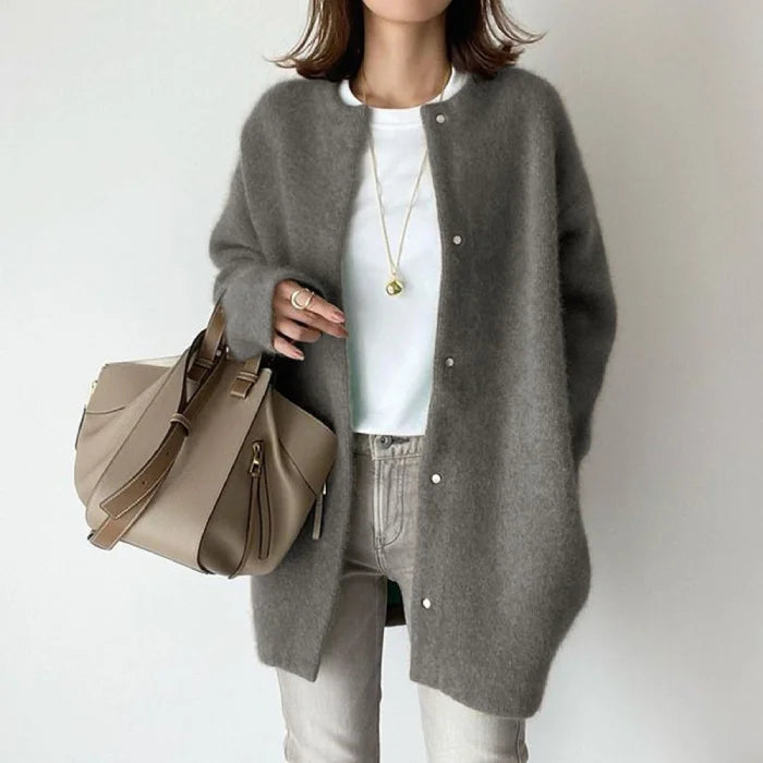 Oversized knit cardigan in dark grey knit fabric styled for chic comfort and easy transitional layering