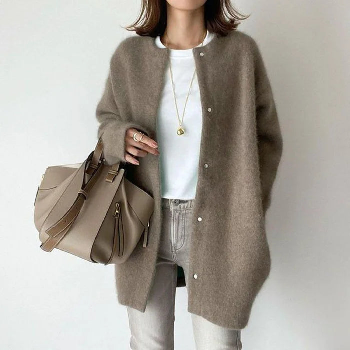 Oversized knit cardigan in neutral taupe shade offering relaxed fit comfort and effortless everyday styling