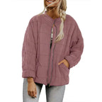  Oversized quilted zip jacket in dusty rose with soft texture and relaxed fit, front view.