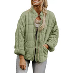 Oversized quilted zip jacket in sage green with suede texture and zipper closure, front view.