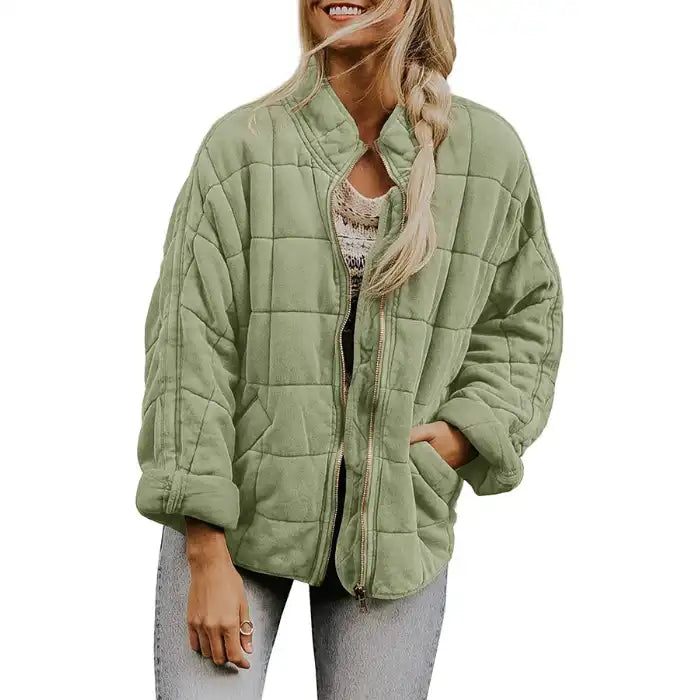  Oversized quilted zip jacket in sage green with suede texture and zipper closure, front view.
