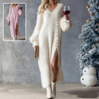 Oversized sweater dress with slit available in white and pink showcasing cozy knit texture and flattering winter fit.