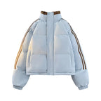 Flatlay of light blue Padded Puffer Jacket with brown trim, high collar, and striped sleeve detail.