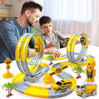 Father and son playing with a yellow loop track race car set featuring engineering signs and props.