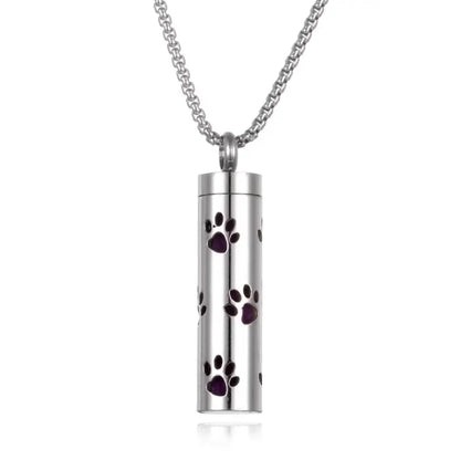 Titanium steel aromatherapy pendant with paw print design for essential oil diffusion necklace.