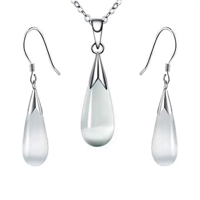 Pendant necklace earrings combo featuring white water drop stones in polished silver metal setting