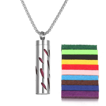 Aromatherapy pendant with petal cut design in stainless steel, including colorful felt pads for oils.