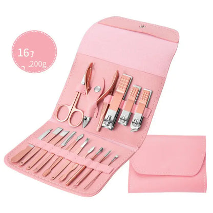 Pink professional manicure kit with nail clippers, scissors and grooming implements in folding leather case