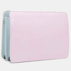 Designer handbag in pastel pink and baby blue leather showing sleek side profile and multi-compartment structure