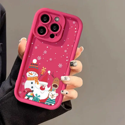 festive Iphone case in pink with Christmas decorations, snowman, santa, rudolf a penguin and white bear.  Compatible with iphone 12-16