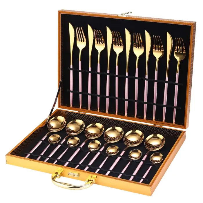 Elegant gold-plated cutlery set with pink handles in deluxe wooden case