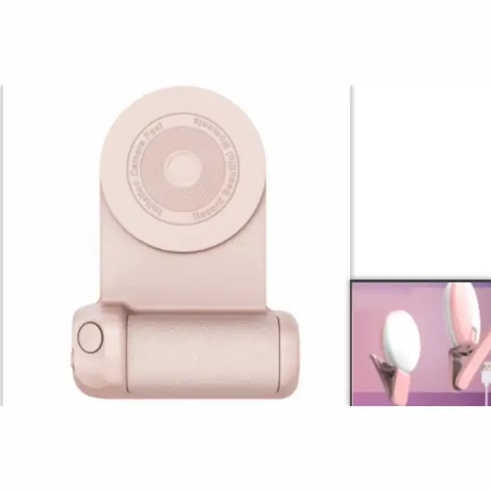 Multifunctional phone grip/stand with magnetic camera handle in blush pink shown from top view.