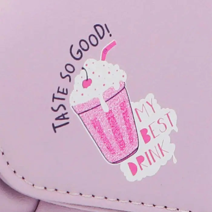 Cute illustration of pink milkshake with whipped cream and cherry saying "Taste So Good My Best Drink" on purple