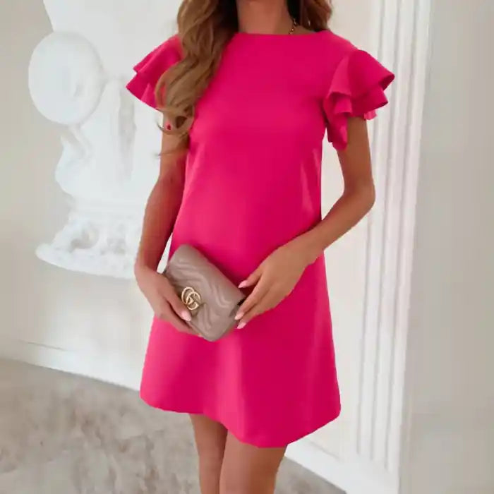 Pink ruffle sleeve shift dress front view with flutter sleeves and smooth clean neckline.