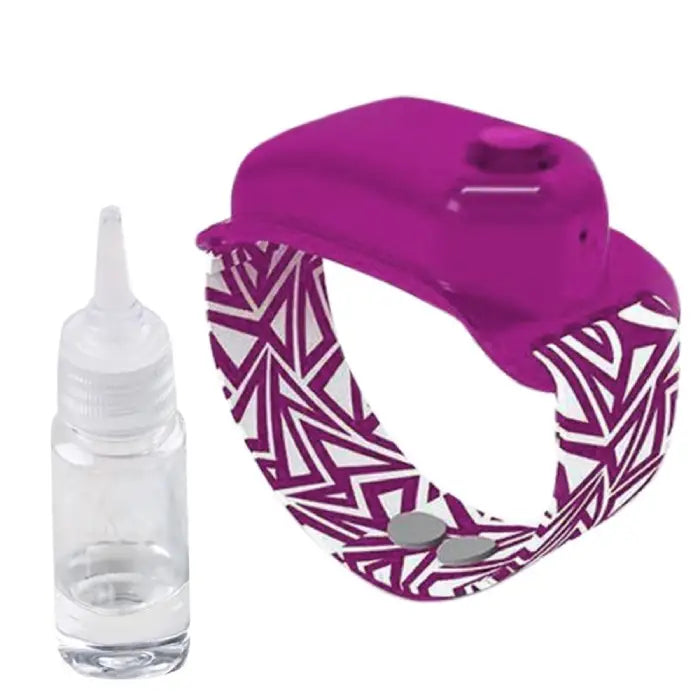 Pink hand sanitizer wristband with a patterned strap and a refillable bottle for easy sanitization.