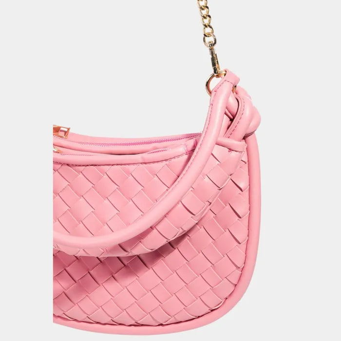 Pink woven leather handbag with gold chain strap and knotted handle detail