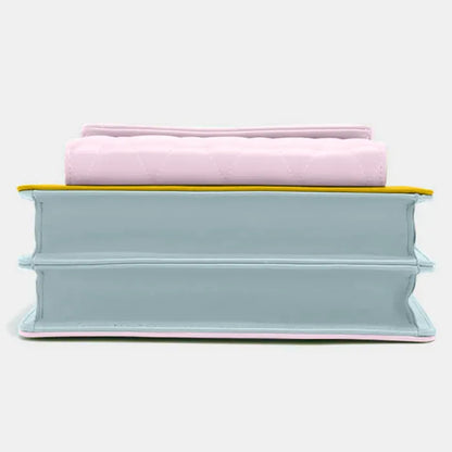 Contemporary handbag design featuring stacked layers in pastel pink, yellow and baby blue leather with modern aesthetics