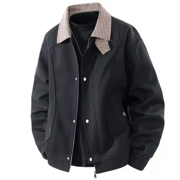  Plaid collar bomber jacket with ribbed cuffs in charcoal black, with contrasting white snap buttons, front view closeup.