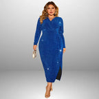 Plus size blue glitter dress styled front view for special occasions with silver jewelry, featuring surplice neckline, long sleeves and side slit