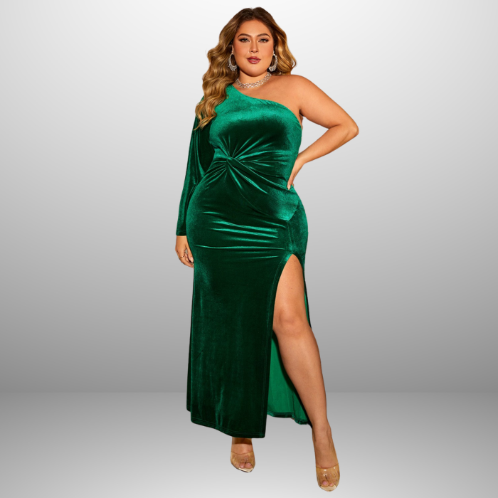 Plus size formal one shoulder dress full frontal view showcasing emerald green velvet fabric, twist detail and flattering silhouette.