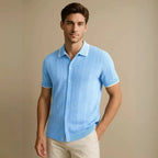  Plus size light blue button down shirt with short sleeves and textured knit pattern