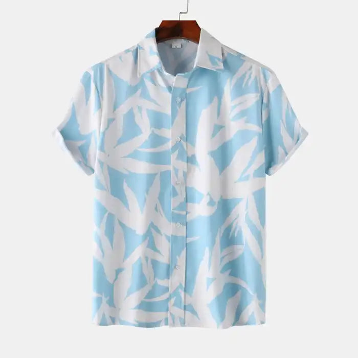 Plus size men's printed short sleeve shirt in blue and white leaf pattern with button front