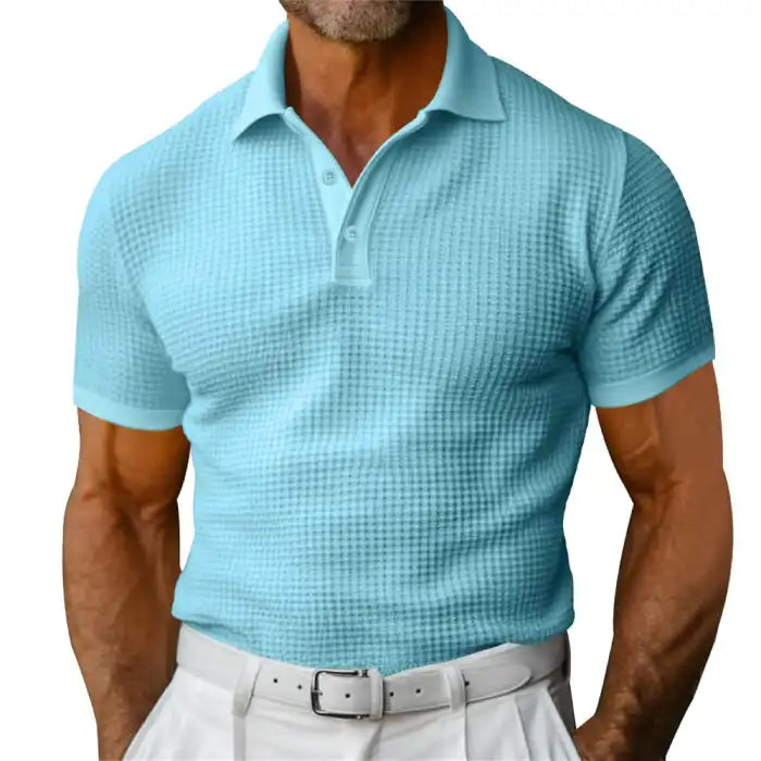  Plus size light blue polo shirt on male model featuring a waffle texture and short sleeves.
