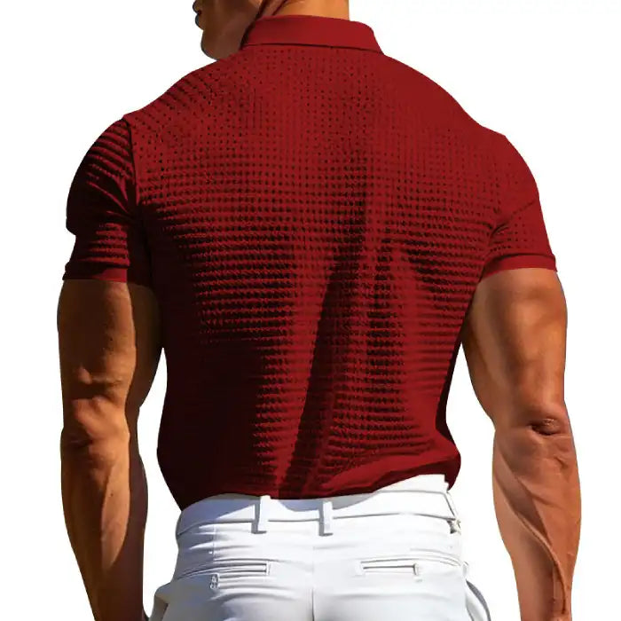  Back view of plus size red polo shirt on a male model highlighting textured waffle fabric.