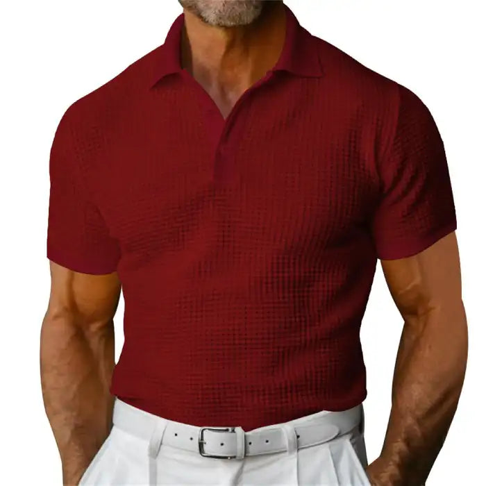 Plus size red polo shirt displayed on a muscular male model with a waffle knit pattern
