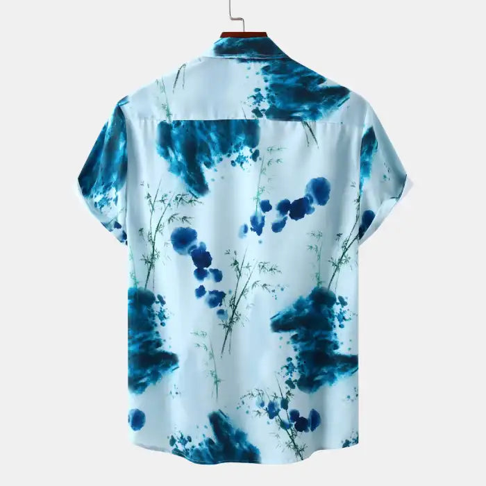 Plus size shirts in blue floral pattern with short sleeves and button-down collar back view