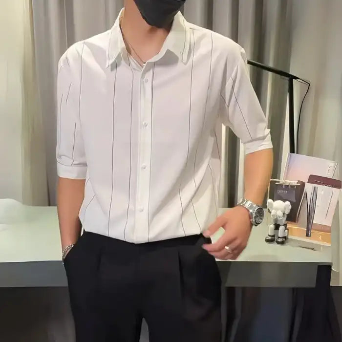  Plus size white striped button up casual shirt paired with black pants and a black mask