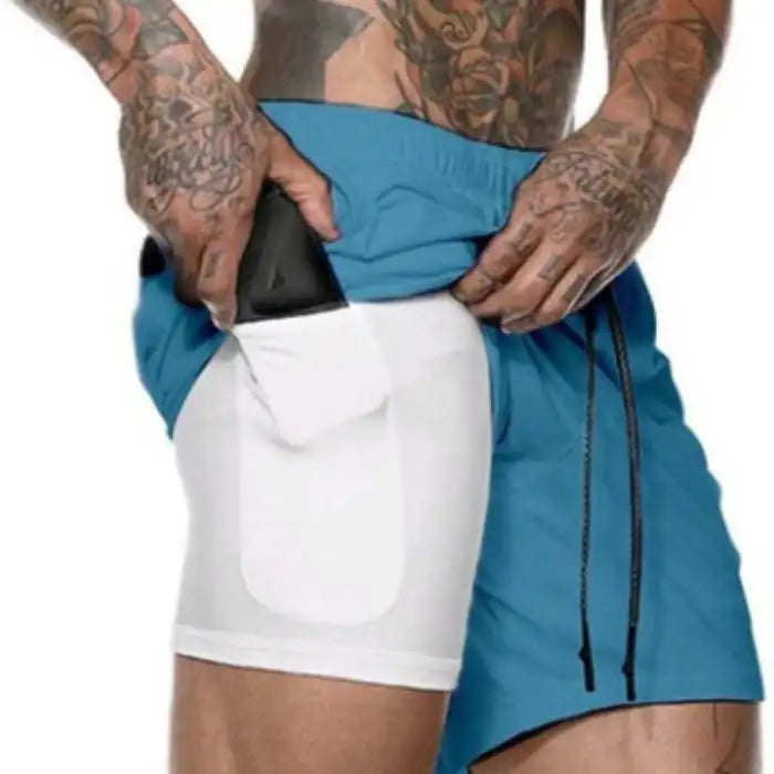 Blue and white pocket compression shorts featuring side phone storage, great for fitness and running.