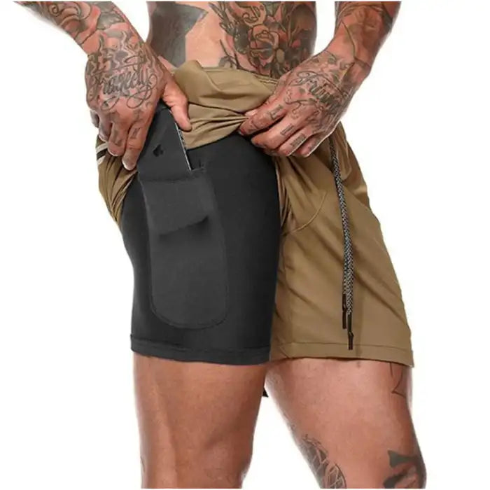 Brown and black pocket compression shorts with fitted inner pocket to hold phone during workouts.