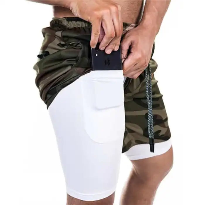 Camo print pocket compression shorts with contrasting white thigh layer and phone holder.